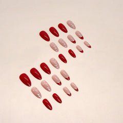 FJSMTOPl 24-piece kit with glue stickers for quick at-home manicures.
