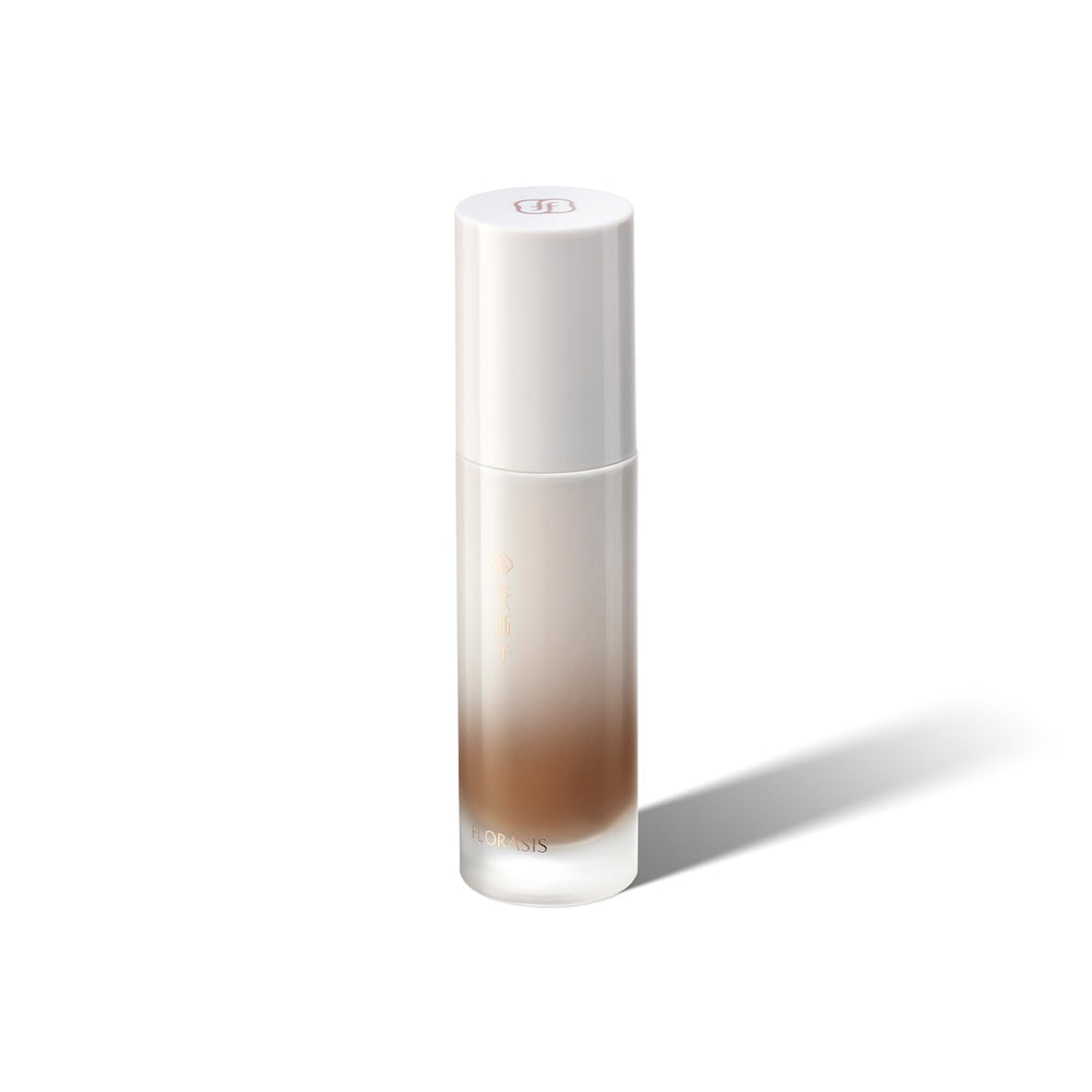 FLORASIS Serum Touch longwear bottle with pump illustrates hydrated, even coverage.