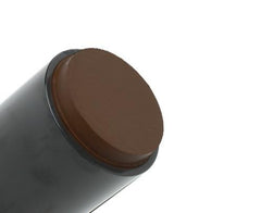 Flori Roberts Base Strokes Creme Foundation Stick being swirled for smooth blending.