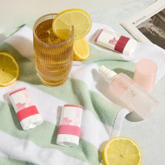 FLOWER Beauty Lip & Cheek Gel Crush applied to lips for hydrating tint.