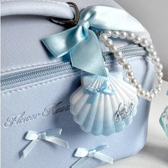 Flower Knows ivory shell design adds elegant, gift ready appeal.