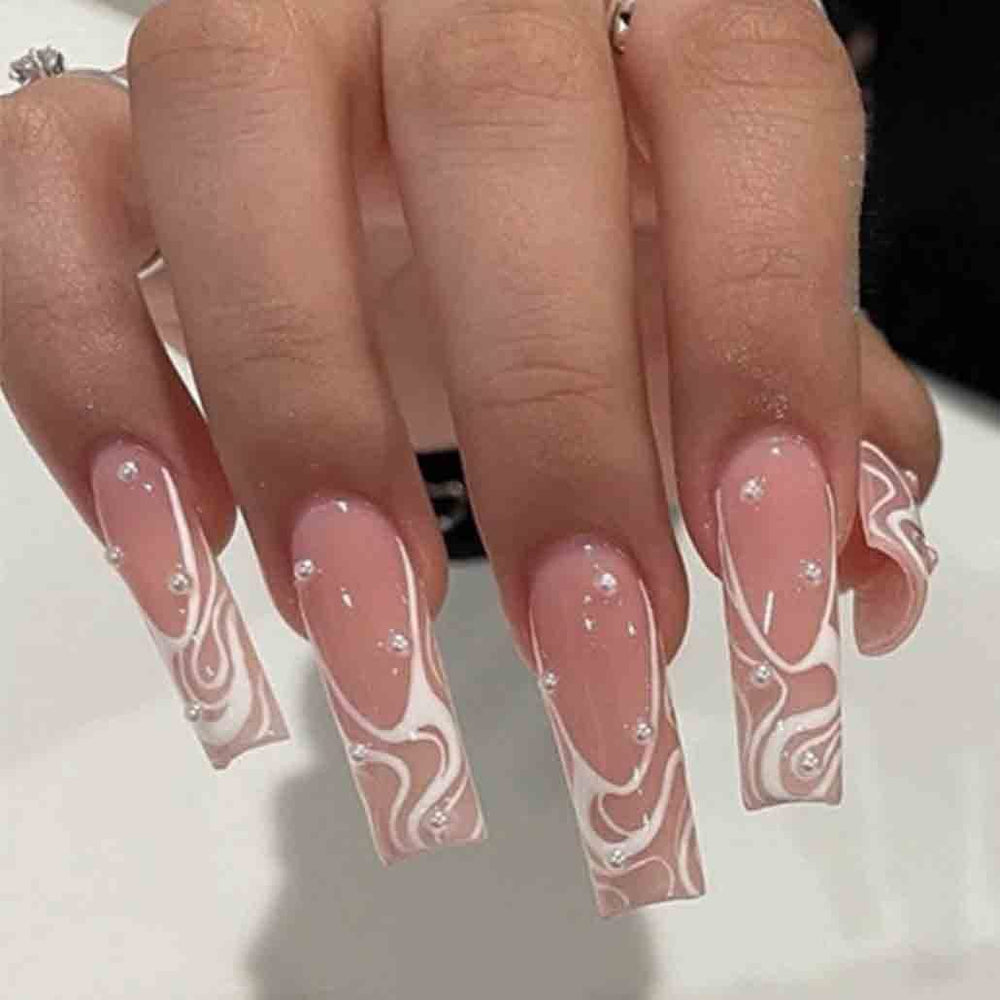 Foccna square press-on nails in pearl pink, closeup for quick at-home manicures.