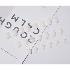 Foccna white nails on hand demonstrating easy 5-minute application.