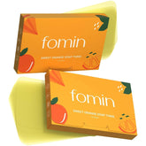 FOMIN orange packaging for antibacterial paper soap sheets, ideal for travel.