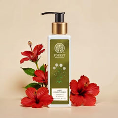 Forest Essentials conditioner applied on damp hair for easy manageability and shine