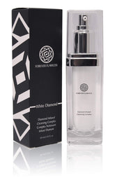 Forever Flawless Diamond Infused Facial Cleanser bottle on a vanity, revealing glow during daily skincare.