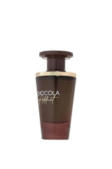 Fragrance World French Avenue Chocola Addict amber-glow bottle captures warm gourmand vibe.