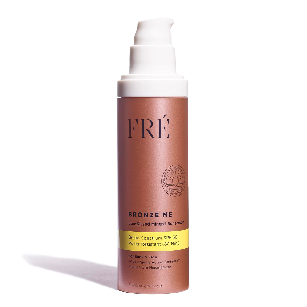 FRÉ Bronze Me SPF 50 bottle front view, tinted mineral sunscreen for everyday protection.