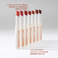 Lip swatch of Freck Beauty MAKEOUT CLUB in dark brown showing buildable coverage.