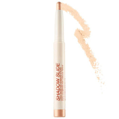 Freck Beauty Shadow Slide warm champagne stick closeup shows vibrant color and smooth glide.