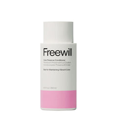 Freewill Color Preserve Conditioner bottle pour shows color protection during application