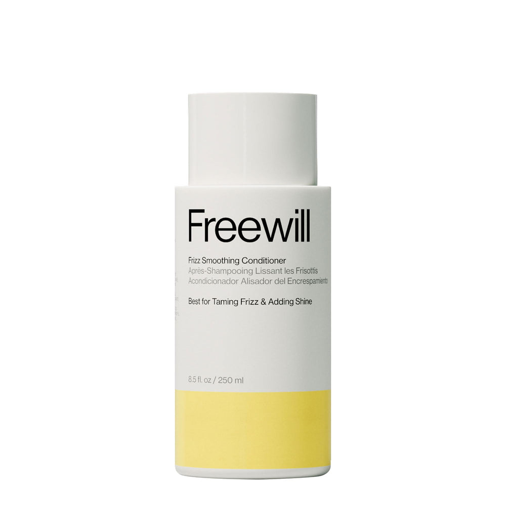 Freewill Frizz Smoothing Conditioner bottle pour showing frizz control benefits