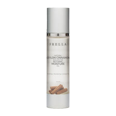 Frella Cinnamon Oil bottle showing easy daily use for skin and hair care.