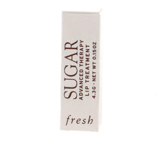 Applying Fresh Sugar Advanced Therapy lip treatment for a smooth, hydrated feel
