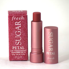 Fresh Sugar Lip Treatment SPF 15 closeup highlights nourishing oils.