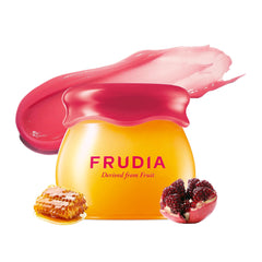 Frudia Pomegranate Honey Lip Balm tube with translucent red tint and hydration.