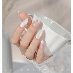 GAOY Nail art with dotting pen using pearl gel to create patterns.