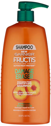 Garnier Fructis Damage Eraser shampoo bottle boosts strength for damaged hair.