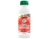 Garnier Fructis Hair Food Watermelon conditioner bottle pouring for detangling ease