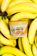 Garnier Fructis 3-in-1 use demonstrates conditioning, masking, or leave-in benefits.