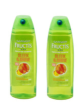 Garnier Fructis Sleek & Shine bottle pour for smooth frizz control.