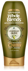 Garnier Whole Blends Legendary Olive conditioner bottle provides nourishing care for dry hair.