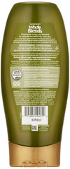 Close-up of the conditioner label highlights virgin-pressed olive oil and olive leaf extracts for wholesome care.