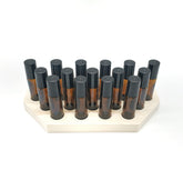 Generic rollerball bottle display rack with natural pine finish, neatly organized 15-hole layout for 10 ml bottles.