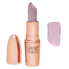 Gerard Cosmetics DM Me glitter lipstick application swatch with purple sparkle and opaque color for bold looks.