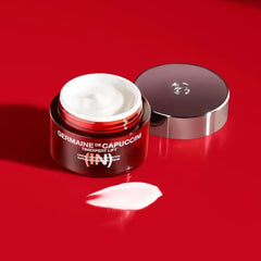Cream texture close-up highlighting luxurious, non-greasy finish.