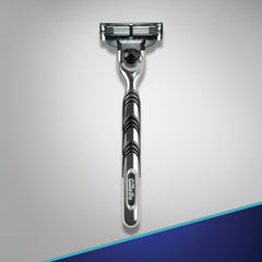 Lubrication strip detail on Gillette Mach3 for skin protection during shave.