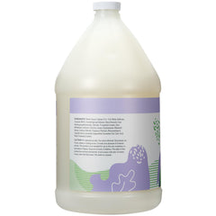 Ginger Lily Farms Botanicals gallon refill jug in a dispenser setup for easy hotel or gym refills.