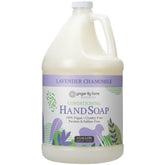 Ginger Lily Farms Botanicals hand soap refill being poured from the bottle with lavender chamomile scent for a soothing cleanse.