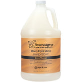 Ginger Lily Farms hand soap bottle with Coco Mango aroma for luxurious cleansing.