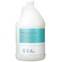 Ginger Lily Farms Club & Fitness Ocean Breeze conditioner texture close-up shows smooth cream.