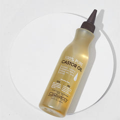 GIOVANNI Castor Oil applied to hair for nourishment and easy detangling.