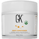 GK HAIR vegan deep conditioning bottle for intense hydration and detangling.
