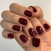 GLAMERMAID burgundy red press-on nails swatch with glossy gel finish