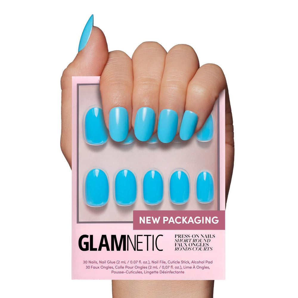 Glamnetic Azure Blue nails in short oval shape for a salon-quality manicure at home.