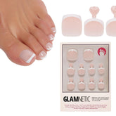 Glamnetic MaDamn toenails in classic white French tip for a glossy pedicure.