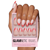 Glamnetic Mrs. Claus nails with Santa hat design for a festive manicure