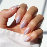 Glamnetic Polar Day nails with short almond shape and lilac ombre tips for durable, salon-style wear.