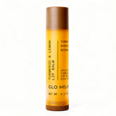 Glo Melanin lemon-turmeric lip balm tube; natural brightening and smooth lips on the go