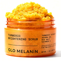 Glo Melanin Turmeric Scrub bottle pours, suggesting a smooth glow and gentle exfoliation.