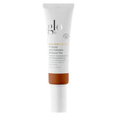 Glo Skin Beauty C-Shield Moisture Tint bottle closeup with lightweight coverage.