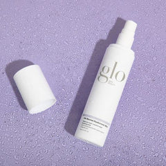 Glo Skin Beauty HA-Revive Hyaluronic Mist spray bottle for a quick moisture boost during daily routines
