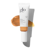 Glo Skin Beauty oil-free tinted primer bottle pump with SPF 30 for medium-deep skin.