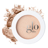 Glo Skin Beauty Skin Glow Powder Highlighter compact swatch shows pearlescent radiance.