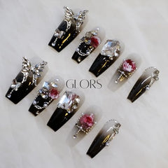 GLORS 3D butterfly embellishments create eye-catching detail for a luxe manicure.