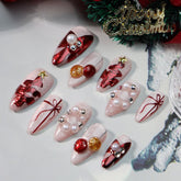 GLORS Christmas press-on nails with almond shape and pearls for festive elegance.